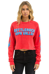 BOTTLEROCK 2025 CROPPED CREW SWEATSHIRT - NEON RED