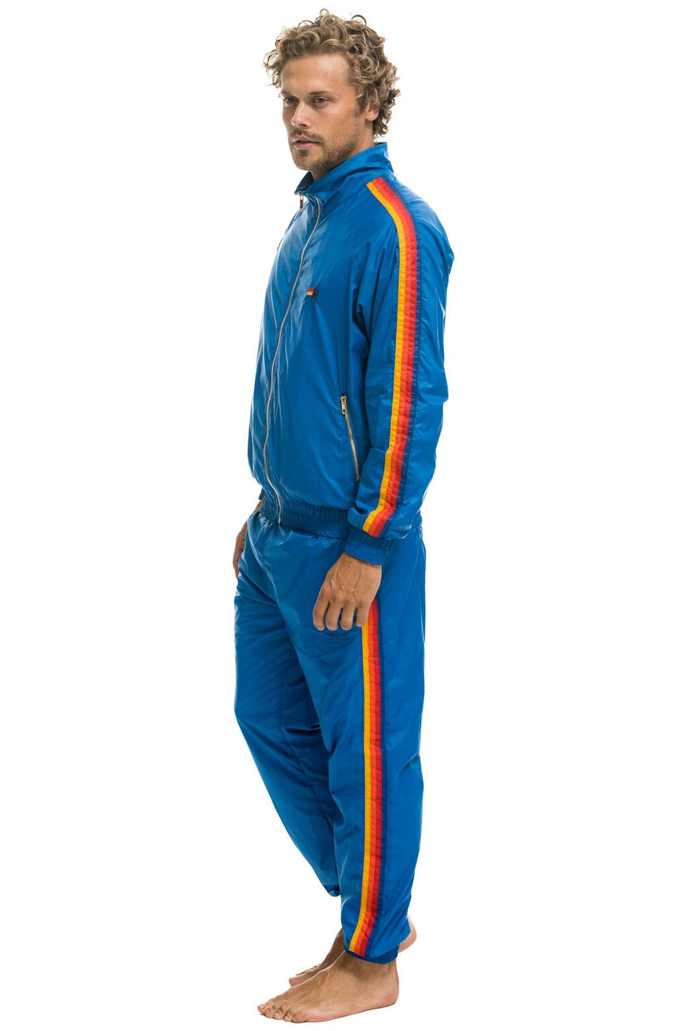 MEN'S 4 STRIPE WINDBREAKER - SNORKEL BLUE