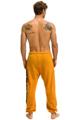 PALM TREE FESTIVAL MONTECITO 2025 UNISEX SWEATPANTS - GOLD