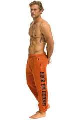 UNIVERSITY OF TEXAS UNISEX CIRCLE PRINT SWEATPANTS - BURNT ORANGE