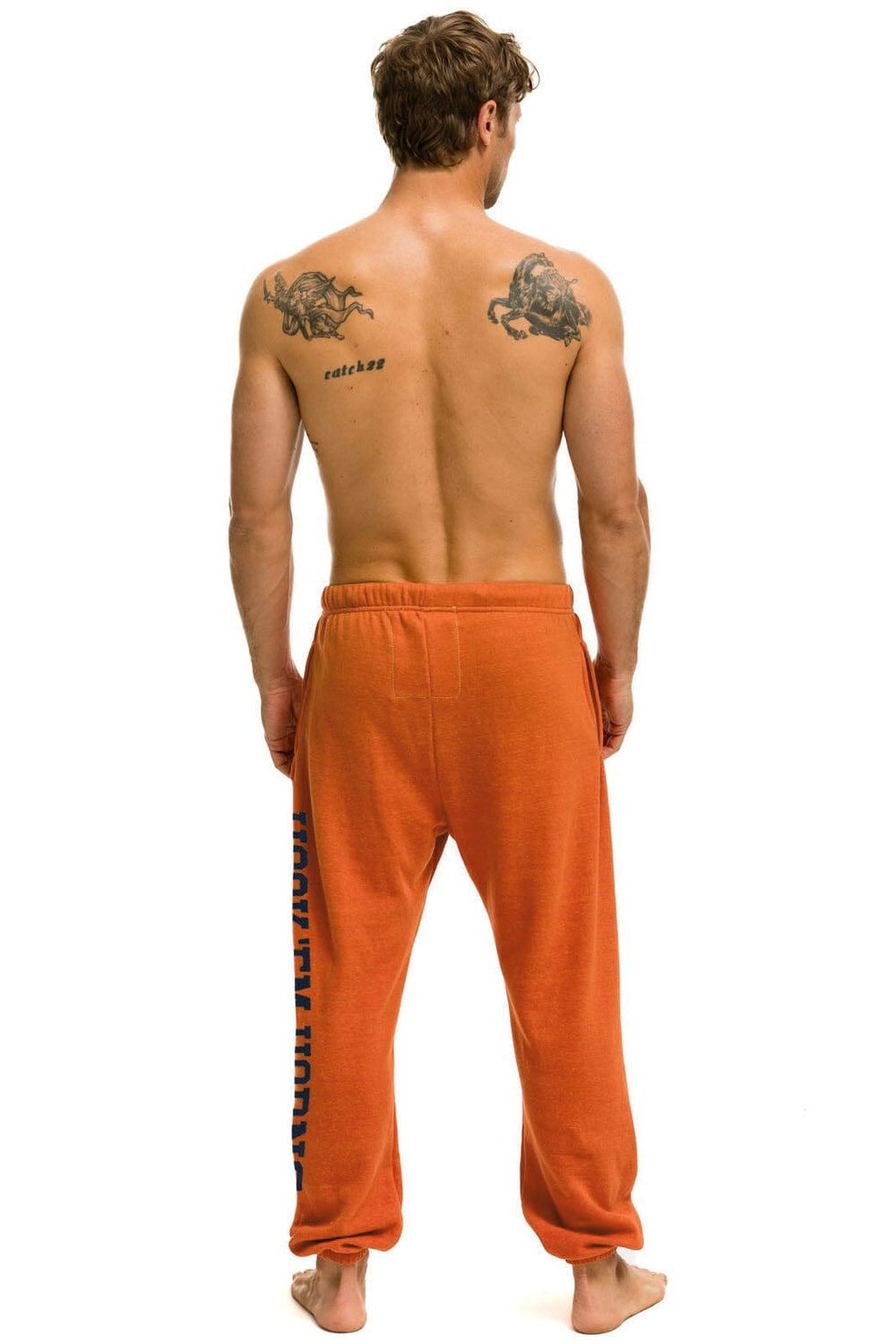 UNIVERSITY OF TEXAS UNISEX CIRCLE PRINT SWEATPANTS - BURNT ORANGE
